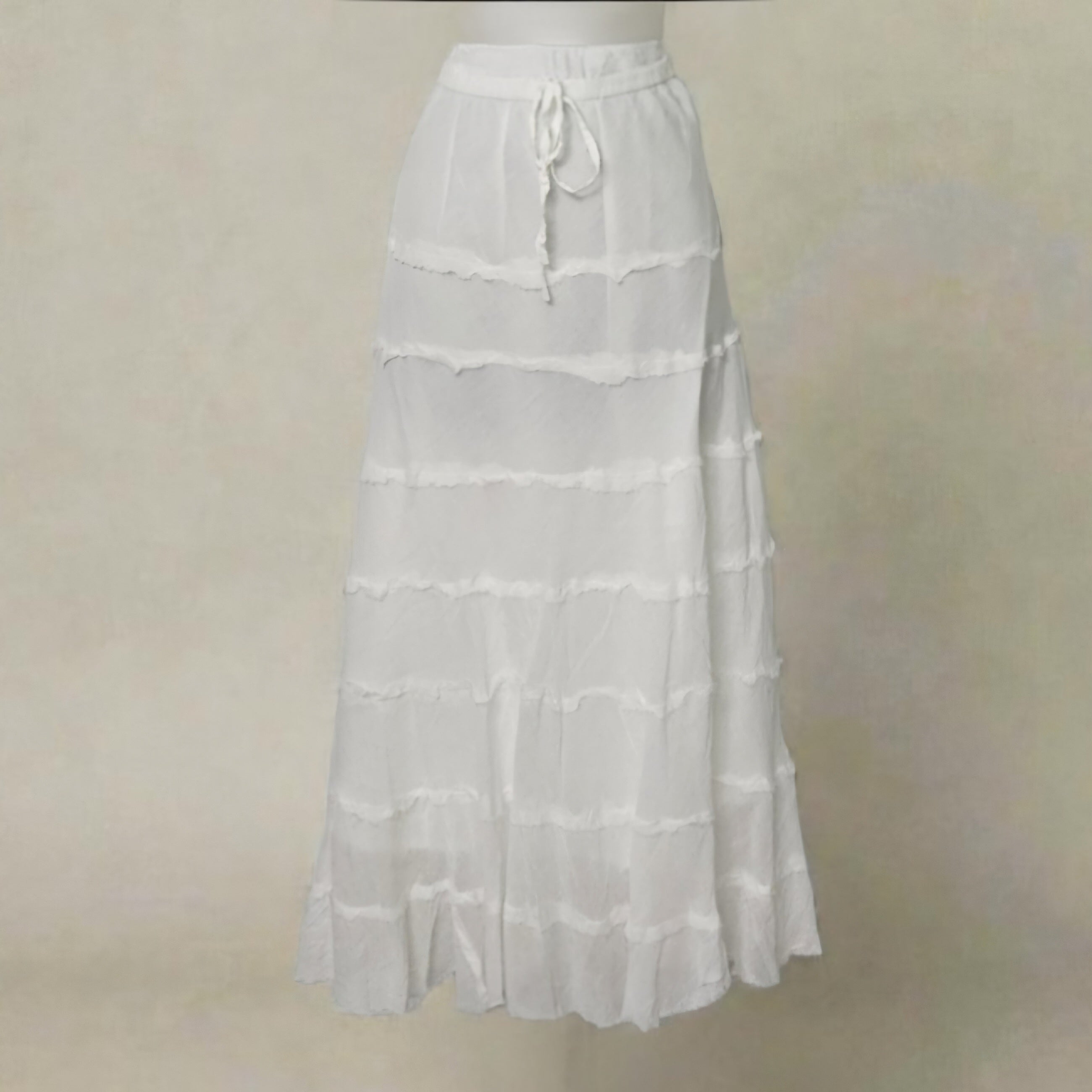 Falda blanca 7 volantes